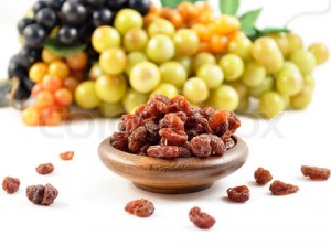 2216925-589698-grape-and-raisins-in-a-wooden-bowl